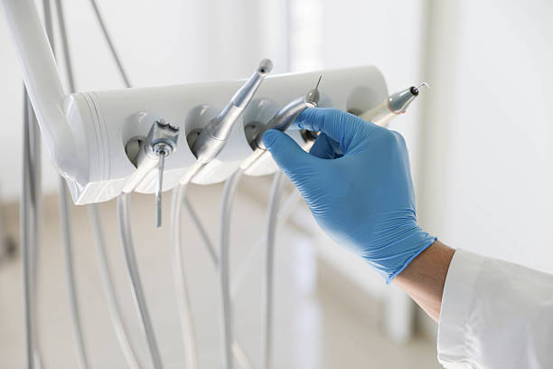 Professional Tooth Extraction technician working in Birmingham, AL